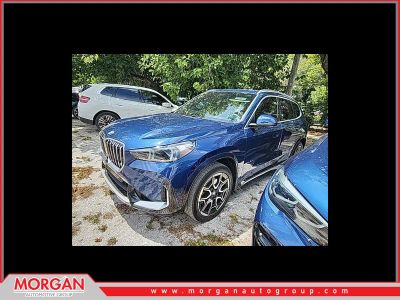 2025 BMW X1 xDrive28i in Phytonic Blue Metallic — front three-quarter view