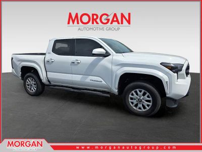 2024 Toyota Tacoma SR5 in White — front three-quarter view