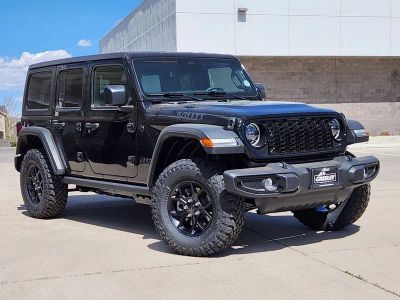 2026 Jeep Wrangler WRANGLER 4-DOOR WILLYS in Black Clear-Coat Exterior Paint — front three-quarter view