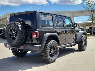 2026 Jeep Wrangler — rear three-quarter view