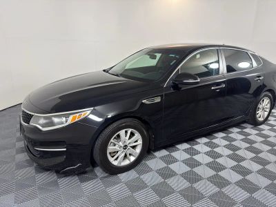2018 Kia Optima LX in Black — front three-quarter view
