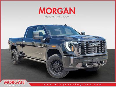 2024 GMC Sierra 2500HD Denali Ultimate in Onyx Black — front three-quarter view