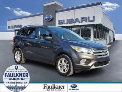 2018 Ford Escape SE 4WD in Magnetic Metallic — front three-quarter view
