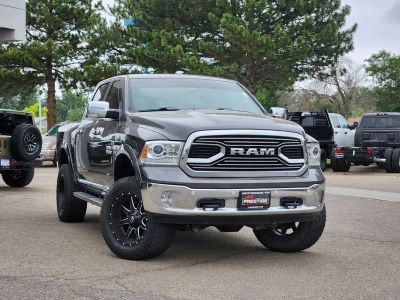 2017 RAM 1500 Limited Crew Cab 4x4 5'7' Box in Granite Crystal Metallic Clearcoat — front three-quarter view