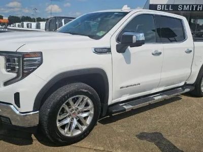 2024 GMC Sierra 1500 SLT in Summit White — front three-quarter view