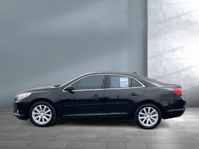 2013 Chevrolet Malibu — rear three-quarter view