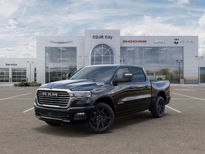 2026 RAM Ram 1500 RAM 1500 LARAMIE CREW CAB 4X4 5'7' BOX in Diamond Black Crystal Pearl-Coat Exterior Paint — front three-quarter view