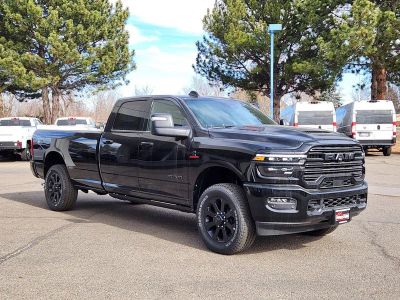 2026 RAM 3500 RAM 3500 LARAMIE CREW CAB 4X4 8' BOX in Diamond Black Crystal Pearl-Coat Exterior Paint — front three-quarter view