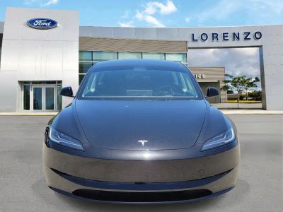2025 Tesla Model 3 — side profile view