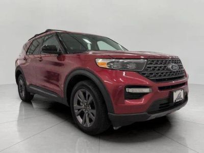 2024 Ford Explorer XLT 4WD in Rapid Red Metallic Tinted Clearcoat — front three-quarter view