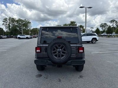 2026 Jeep Wrangler — rear three-quarter view