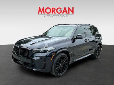 2024 BMW X5 — rear three-quarter view