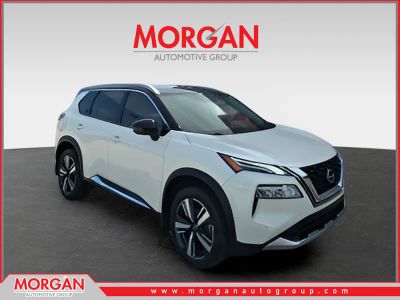 2023 Nissan Rogue Platinum in White — front three-quarter view