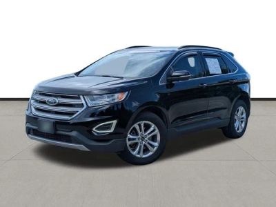 2018 Ford Edge SEL in Shadow Black — front three-quarter view