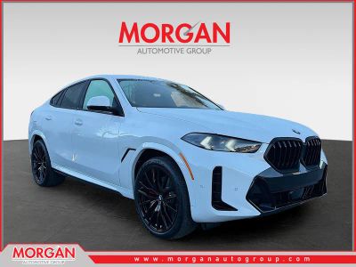 2026 BMW X6 xDrive40i in Alpine White — front three-quarter view