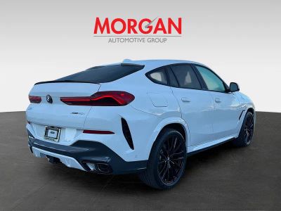2026 BMW X6 — rear three-quarter view