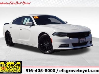 2018 Dodge Charger V6 in White — front three-quarter view