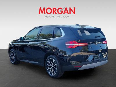 2026 BMW X3 — rear three-quarter view