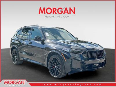 2026 BMW X5 xDrive40i in Black Sapphire Metallic — front three-quarter view