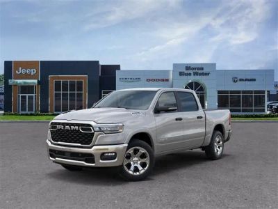 2026 RAM Ram 1500 RAM 1500 BIG HORN CREW CAB 4X4 5'7' BOX in Silver Zynith Exterior Paint — front three-quarter view