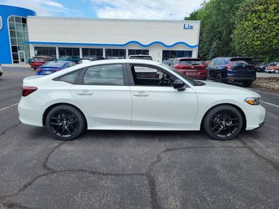 2026 Honda Civic Sedan Sport CVT — rear three-quarter view