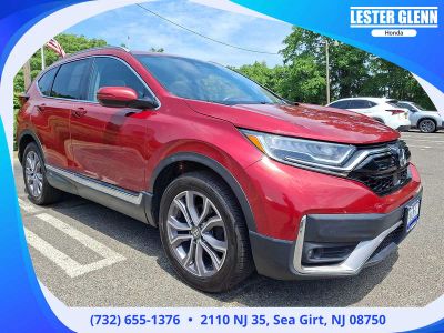 2022 Honda CR-V Touring in Radiant Red Metallic — front three-quarter view