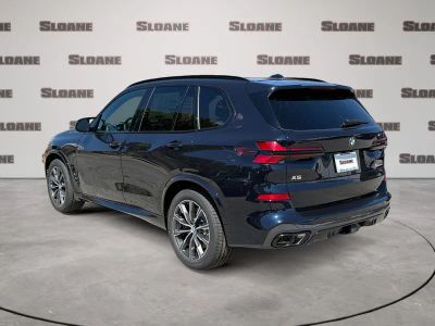 2026 BMW X5 — rear three-quarter view