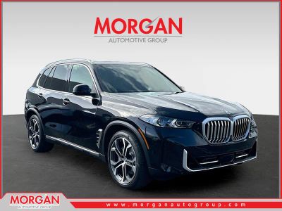 2026 BMW X5 xDrive50e in Black — front three-quarter view
