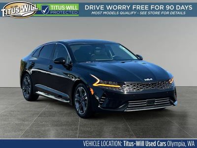 2022 Kia K5 EX in Ebony Black — front three-quarter view
