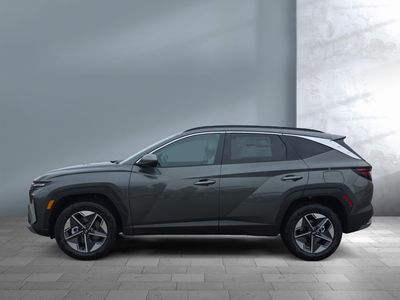 2026 Hyundai Tucson Hybrid — rear three-quarter view