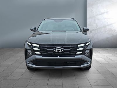 2026 Hyundai Tucson Hybrid — side profile view