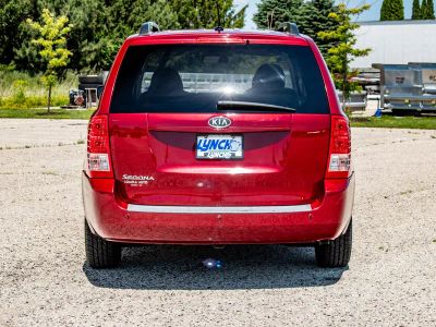 2012 Kia Sedona — rear three-quarter view
