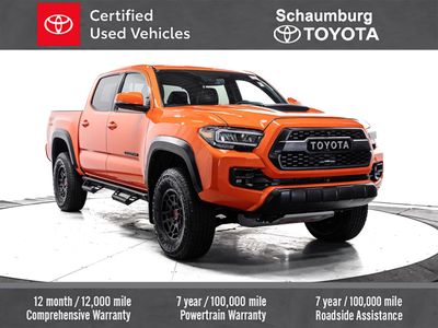 2023 Toyota Tacoma TRD Pro in Orange — front three-quarter view
