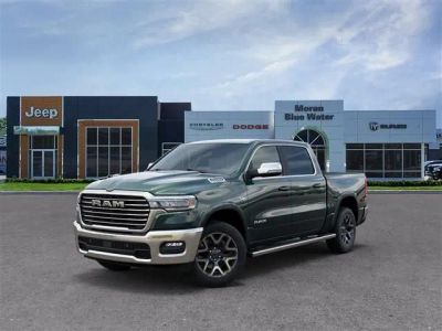 2026 RAM Ram 1500 RAM 1500 LARAMIE CREW CAB 4X4 5'7' BOX in Serrano-Green Metallic Exterior Paint — front three-quarter view