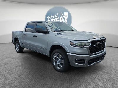 2026 RAM 1500 Big Horn/Lone Star in Silver Zynith — front three-quarter view