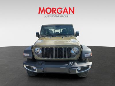 2026 Jeep Gladiator Sport in Green — front three-quarter view