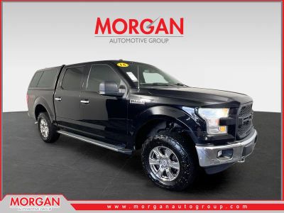 2016 Ford F-150 XLT in Shadow Black — front three-quarter view