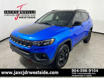 2023 Jeep Compass Trailhawk in Laser Blue Pearlcoat — front three-quarter view