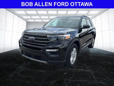 2024 Ford Explorer XLT in Agate Black — front three-quarter view