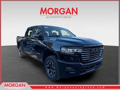 2026 Ram 1500 Laramie in Diamond Black Crystal Pearlcoat — front three-quarter view