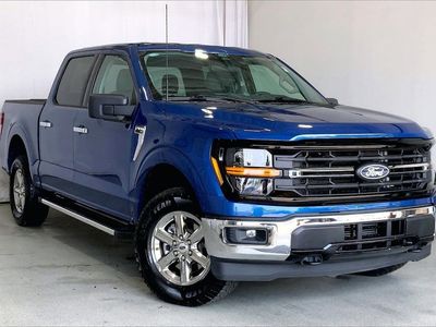 2025 Ford F-150 in Blue Metallic — front three-quarter view