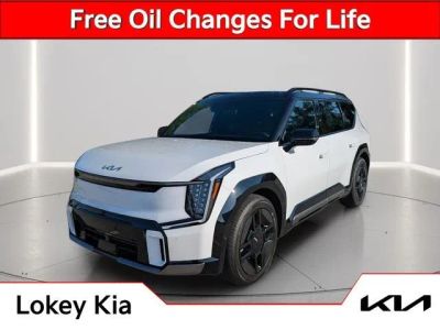 2026 Kia EV9 GT-Line in Glacial White Pearl/Ebony Black Roof — front three-quarter view