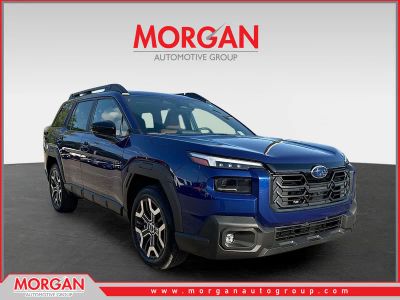 2026 Subaru Outback Touring XT in Sapphire Blue Pearl — front three-quarter view