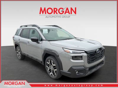2026 Subaru Outback Touring XT in River Rock Pearl — front three-quarter view