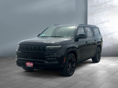 2024 Jeep Grand Wagoneer — front three-quarter view