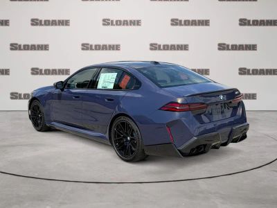 2027 BMW M5 — rear three-quarter view