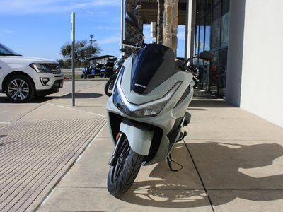 2025 Honda PCX160AS — rear three-quarter view