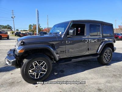 2026 Jeep Wrangler — rear three-quarter view