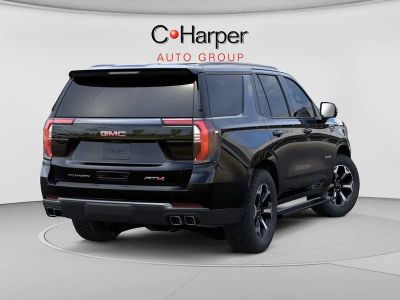 2026 GMC Yukon — rear three-quarter view