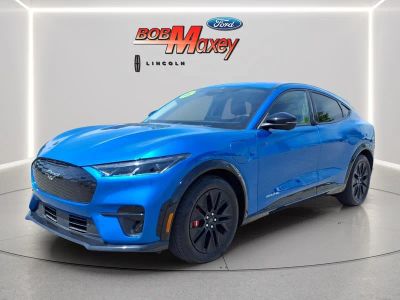 2025 Ford Mustang Mach-E Premium in Blue Metallic — front three-quarter view